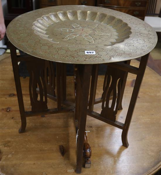 A brass Benares table, W.59cm